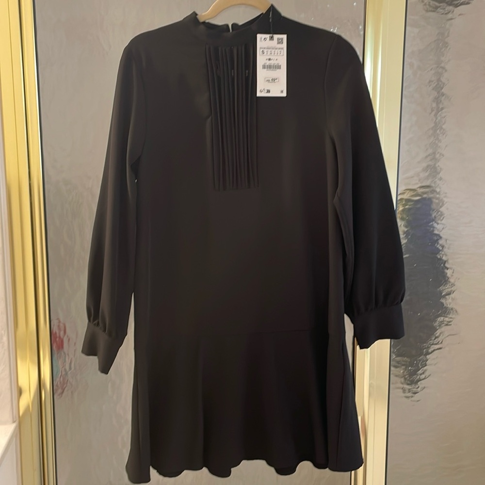 Tags on black short dress never worn